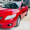 Rent Toyota Corolla sedan red color for your Holiday in Sri Lanka