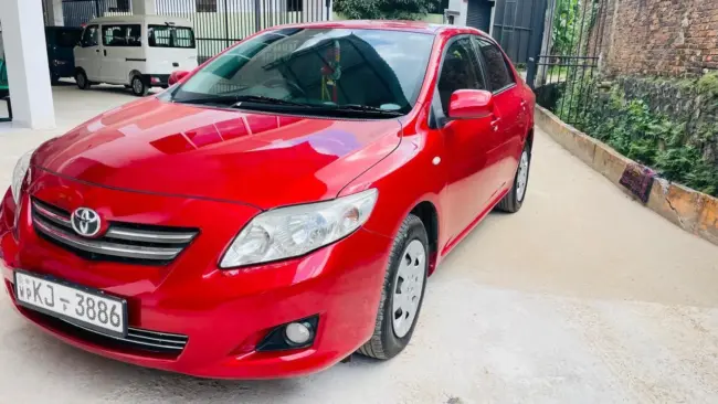 Rent Toyota Corolla sedan red color for your Holiday in Sri Lanka