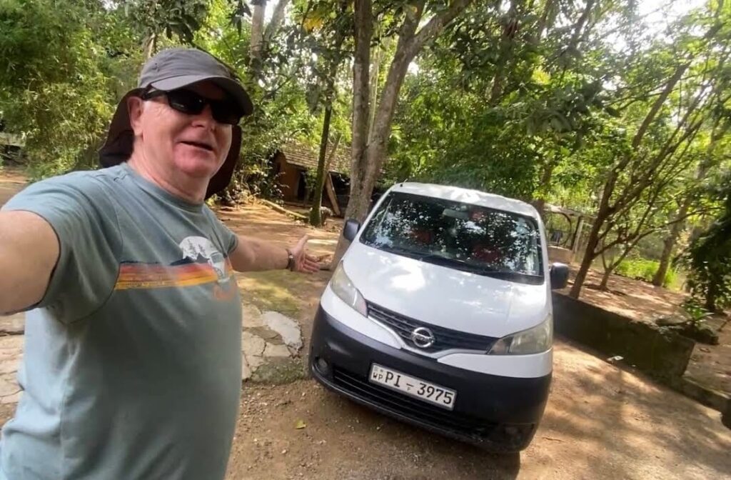 Happy client with the car of Lanka Rent a Car